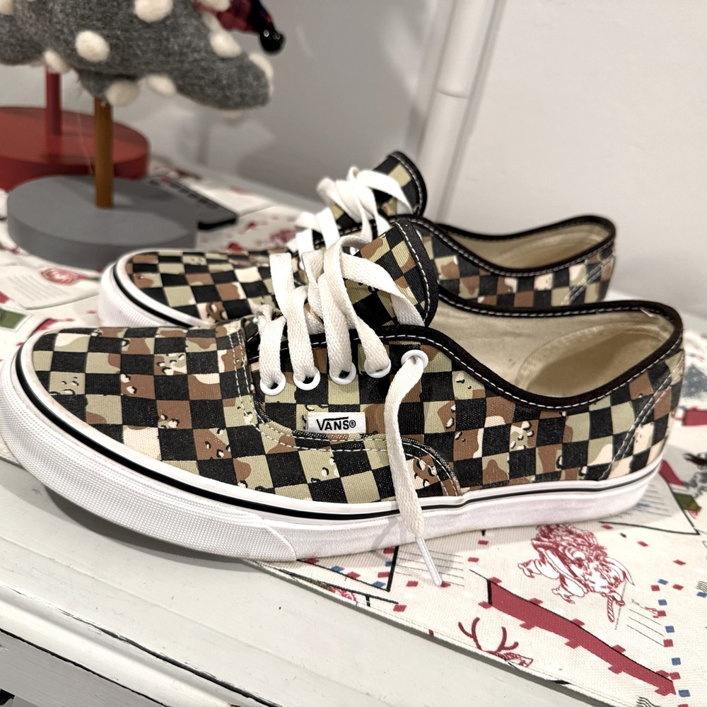 Men’s size 10 Camo vans. Like new only worn twice!